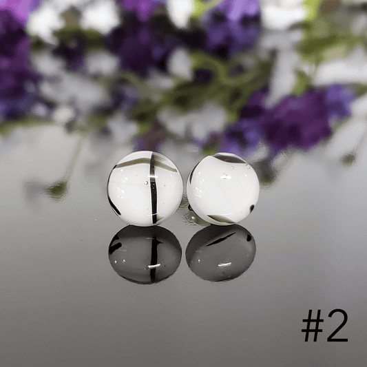 Édition puces blanches et lignes noires - Bijoux Le fil d'Ariane