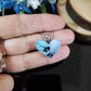 Coeur bleu pâle avec orchidées - Bijoux Le fil d'Ariane