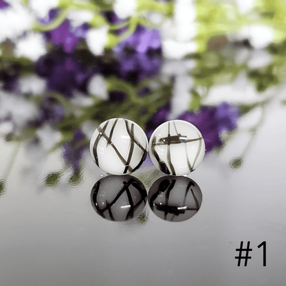 Édition puces blanches et lignes noires - Bijoux Le fil d'Ariane