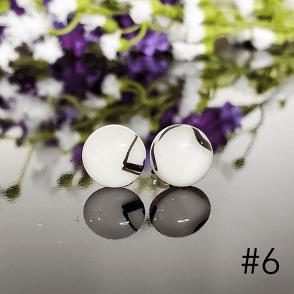 Édition puces blanches et lignes noires - Bijoux Le fil d'Ariane