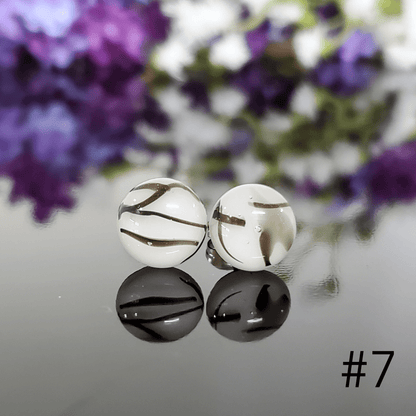 Édition puces blanches et lignes noires - Bijoux Le fil d'Ariane